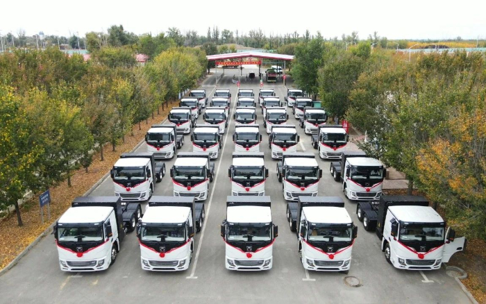 脱碳“换”绿举行时！至尊国际新能源重卡批量交付西北